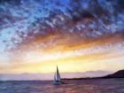 Solitary Sailboat Sunset