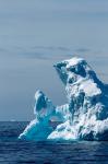 An arched iceberg floating in Gerlache Strait, Antarctica.