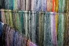 China, Suzhou. Hanging silk threads, market