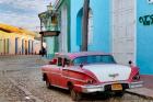 Colorful buildings and 1958 Chevrolet Biscayne, Trinidad, Cuba