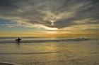 Sunrise On Surfer With Board Walking Through Shore Waves, Cape May NJ