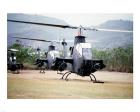 Three AH-1 Cobra gunship helicopters
