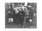 Thomas Alva Edison using his dicatating machine