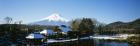 Houses in front of a mountain, Mt Fuji, Honshu, Japan