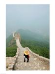 Tourist climbing up steps on a wall, Great Wall of China, Beijing, China