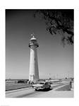 USA, Mississippi, Biloxi, Biloxi Lighthouse with street in the foreground