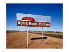 Distance sign on the road side, Ayers Rock, Uluru-Kata Tjuta National Park, Australia