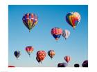 Low angle view of hot air balloons in the sky, Albuquerque, New Mexico, USA