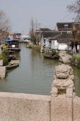 Stone lion on bridge, Zhujiajiao, Shanghai, China | Obraz na stenu