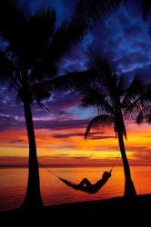 Woman in hammock, and palm trees at sunset, Coral Coast, Viti Levu, Fiji | Obraz na stenu
