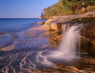 Waterfall Flows Across Sandstone Shore At Miners Beach | Obraz na stenu