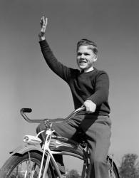 1940s 1950s Smiling Boy Riding Bike Waving | Obraz na stenu