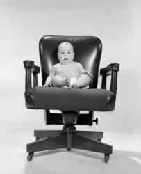 1960s Baby Sitting In Executive Office Chair | Obraz na stenu