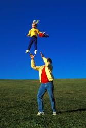 1990S Father Tossing Daughter Up In The Air | Obraz na stenu