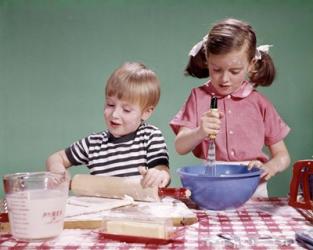 1960s  Boy And Girl Mixing Ingredients For Cookies | Obraz na stenu