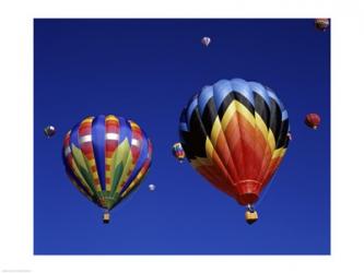 Low angle view of hot air balloons rising, Albuquerque International Balloon Fiesta, Albuquerque, New Mexico, USA | Obraz na stenu